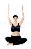 Portrait of beautiful young woman doing yoga exercise