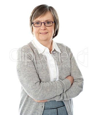 Elderly corporate woman posing in style