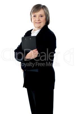 Corporate lady posing with documents