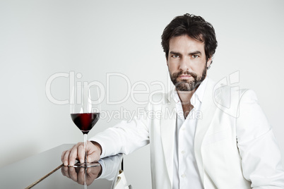 handsome man and a glass of red wine