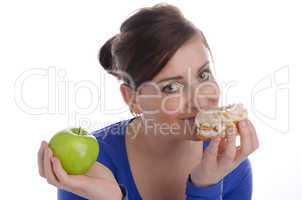 Woman with apple and biscuit
