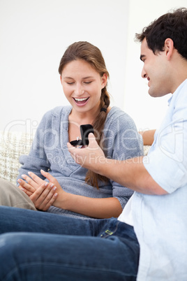 Man offering a ring to a Woman