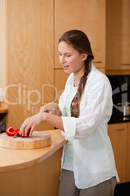 Woman cutting a pepper