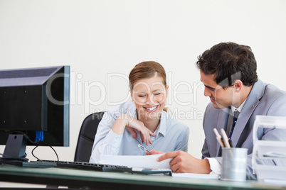 Businessman showing something to a colleague