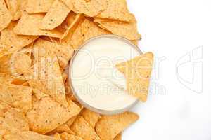 Bowl of dip surrounded by chips
