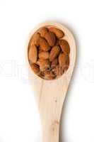 Wooden spoon with almonds