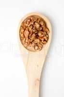 Wooden spoon with nuts