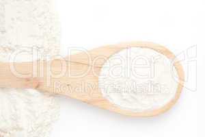 Wooden spoon with flour