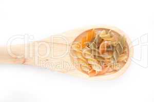 Wooden spoon with pasta