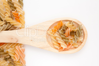 Wooden spoon with pasta