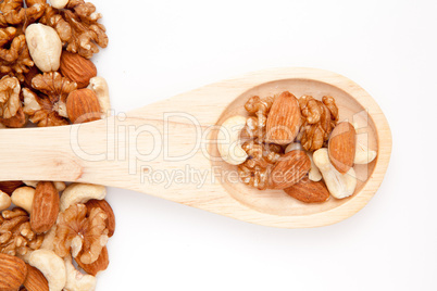 Wooden spoon with nuts