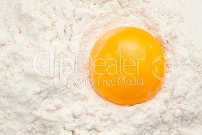 Egg yolk on the flour