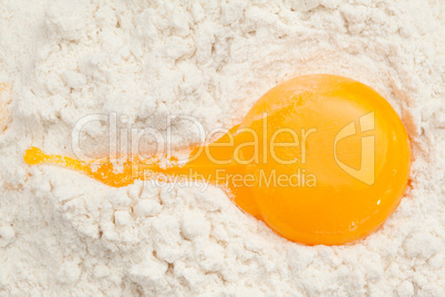 Egg yolk on the flour