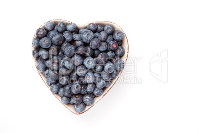 Blueberries in a heart shaped bowl