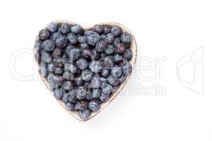 Blueberries in a heart shaped bowl