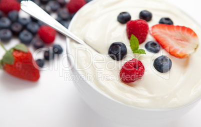 Berries in a bowl with cream