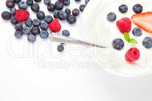 Dessert of berries with cream