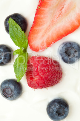 Different berries in cream