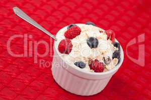 Pot of berries and whipped cream