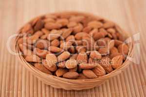 Bowl full of roasted almonds