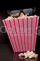 3D glasses on a box of pop corn