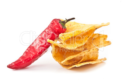 Pepper beside a small stack of crisps