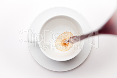 Empty coffee cup being filled