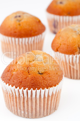 Four small baked muffins