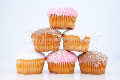 Pyramid of muffins with icing sugar