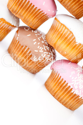 Close up on many muffins with icing sugar