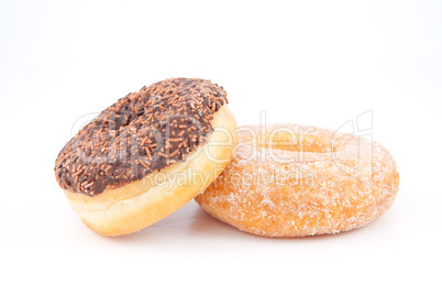 Two doughnuts with icing sugar