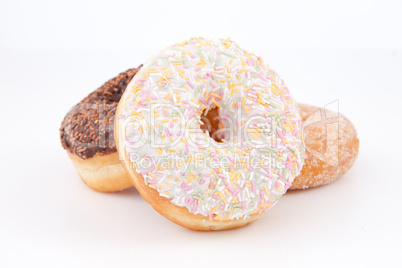 Three doughnuts with icing sugar