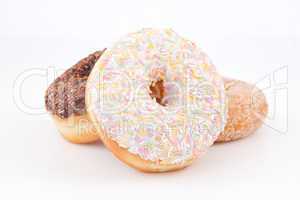 Three doughnuts with icing sugar