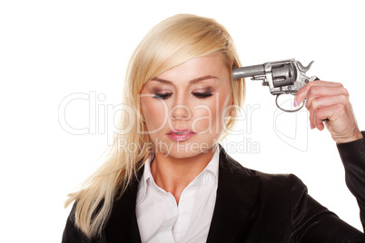 Professional woman holding a gun to her head