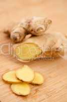 Slice of ginger and blurred piece of ginger