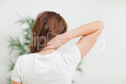 Woman massaging her neck