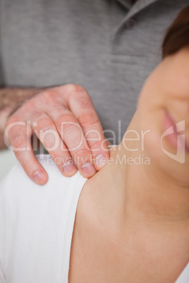 Close-up of a man massaging the nape of a woman