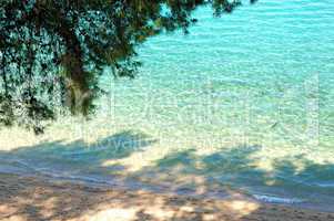 Beach and turquoise water of Aegean Sea, Halkidiki, Greece