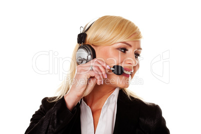 Smiling woman using headphones and mike