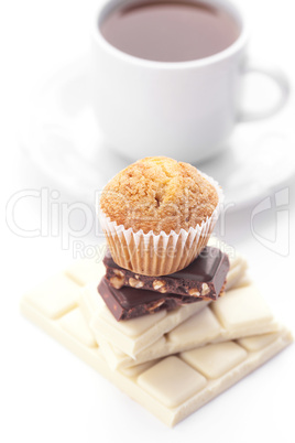 bar of chocolate,tea and muffin isolated on white