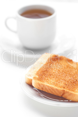 tea and toast isolated on white