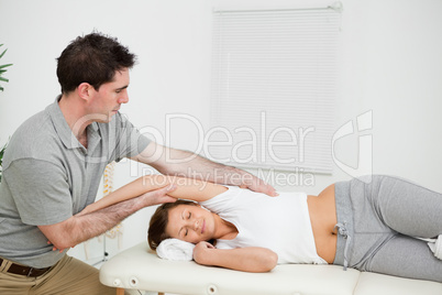 Peaceful woman being stretched