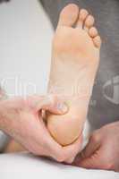 Foot being raised by a chiropodist