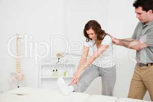 Peaceful woman stretching her body