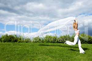 Woman running with white scarf
