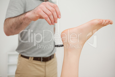 Reflex hammer being held by a doctor