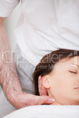 Close-up of woman being manipulating by a therapist