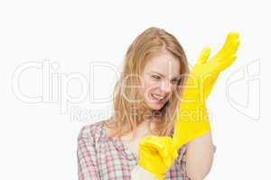 Angry woman wearing cleaning cloves