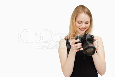 Cheerful woman looking at her camera