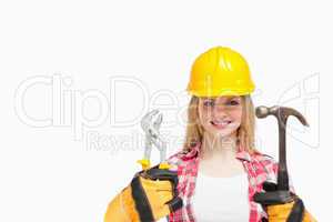 Woman smiling while wearing a safety helmet